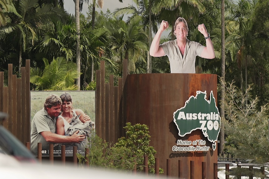 Large photos of Steve Irwin and Terri Irwin outside the entrance to Australia Zoo.