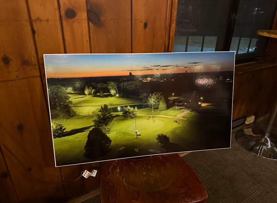 A rendering displayed at an open house Thursday, Feb. 26, 2026, shows what lights at Waveland Golf Course would look like in a plan for night golfing on the front nine holes at the course, 4200 University Ave.