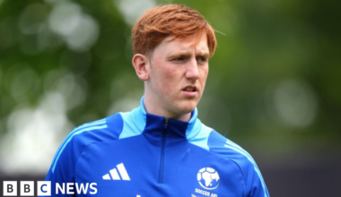 Angry Ginge  in a UNICEF football training top