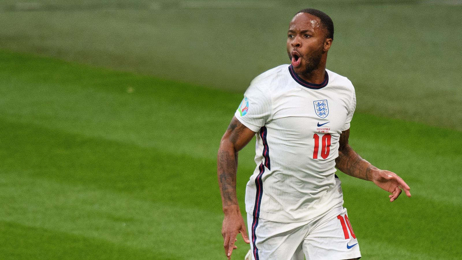 Raheem Sterling celebrates after scoring for England at Euro 2020