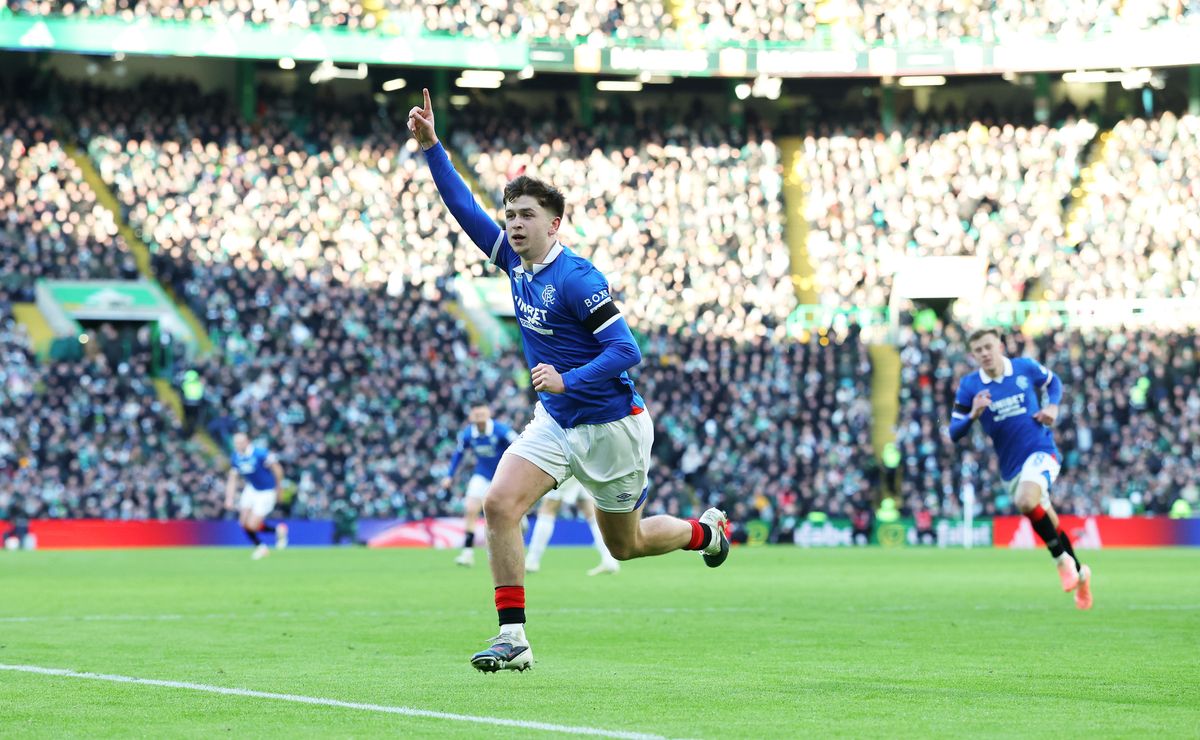 Mikey Moore celebrates scoring the third goal between Celtic and Rangers at Celtic Park