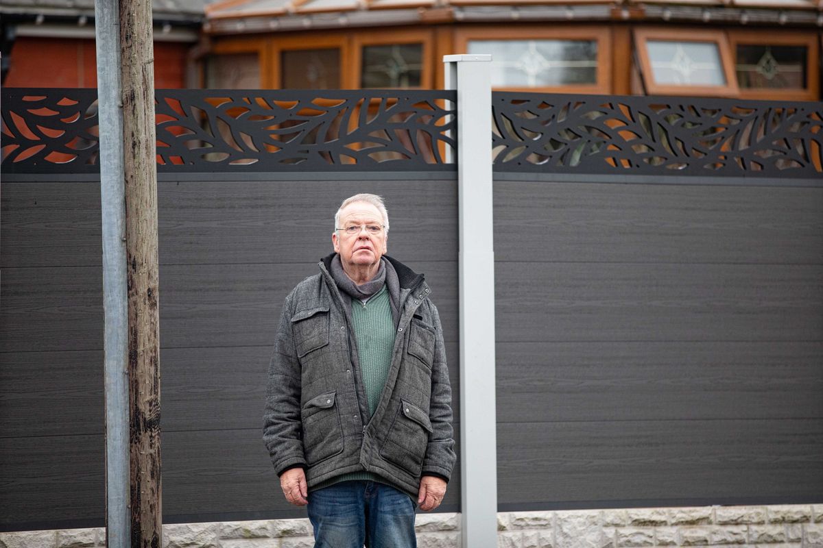 An elderly couple have blasted council bosses after being ordered to rip down a 6 ft tall fence built to stop people nosing into their house. David Hopwood, and his wife Denise, erected the grey composite fence in front of their Home in Farnworth, Bolton, Gtr Manchester, to provide privacy and security. March 9, 2026. // A retired couple have hit out at council chiefs who have ordered them them to rip down a £4,500 seven foot high fence - because of its colour. David and Denise Hopwood erected the 25 metre long, grey composite fence around their home after ripping up an old, nine-foot-high hedge that they were finding difficult to maintain. However a neighbour complained about its height forcing David, 67, and Denise, 66, to see retrospective planning permission. This week the couple, from Bolton, Gtr Manchester, were told permission had been refused because it was' out of touch with the character and appearance of the surrounding area.' The couple hit back saying that the hedge had become 'too difficult to maintain' at their age and was costing £800 a year to look after.
