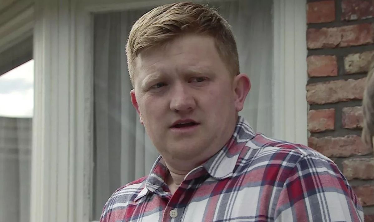 A man in a plaid shirt