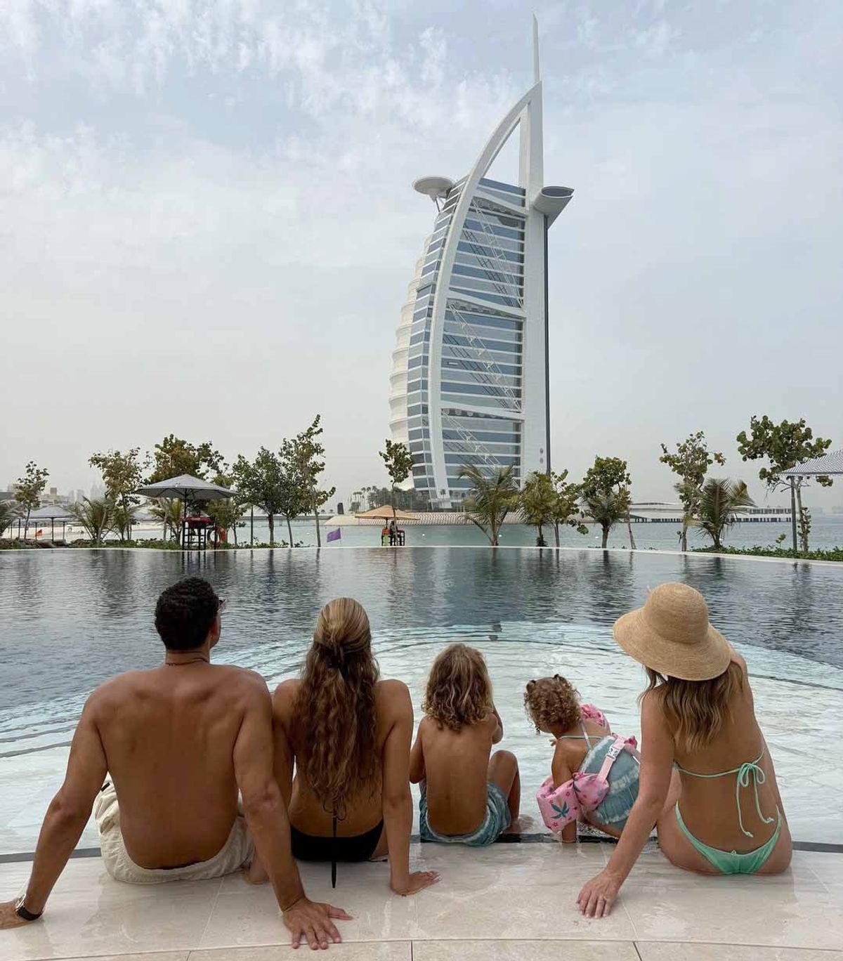 Rio Ferdinand and wife Kate in Dubai with their children.