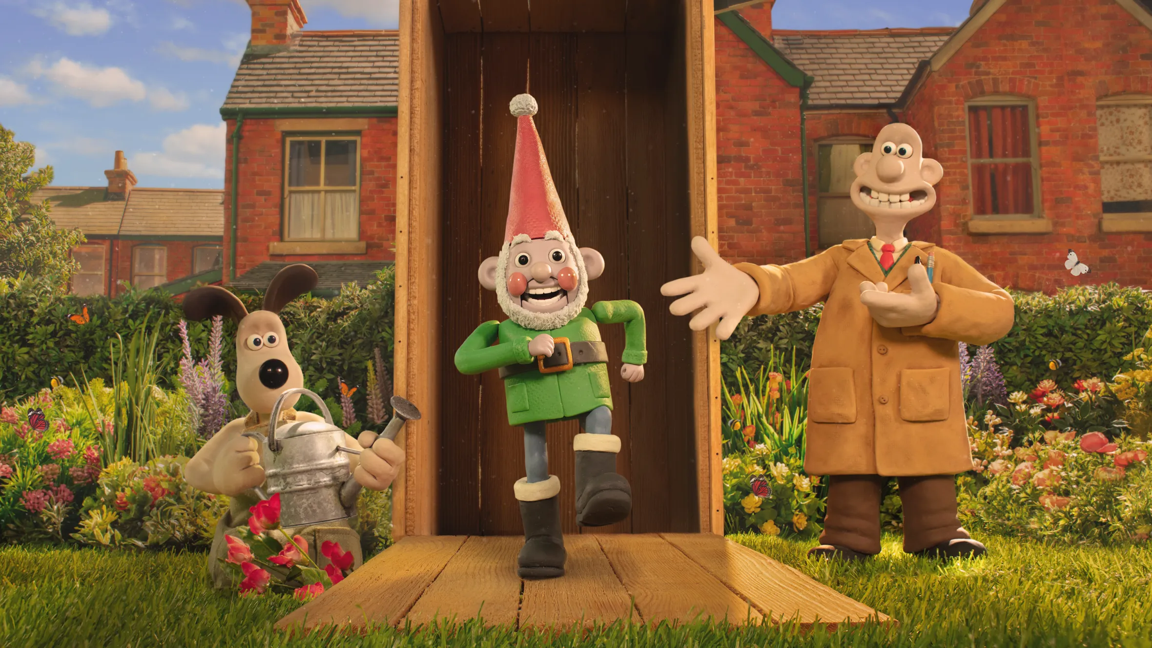 Illustration of Gromit, Norbot the robot gnome, and Wallace in a garden.