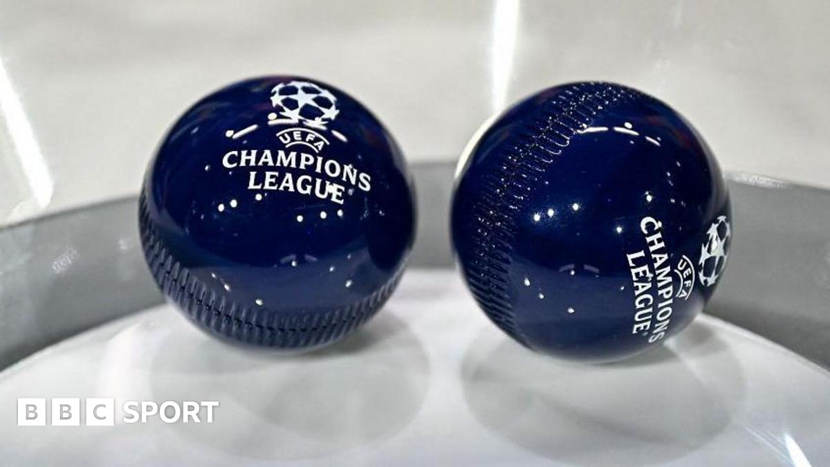 This photograph shows the draw balls bearing the Champions League logo