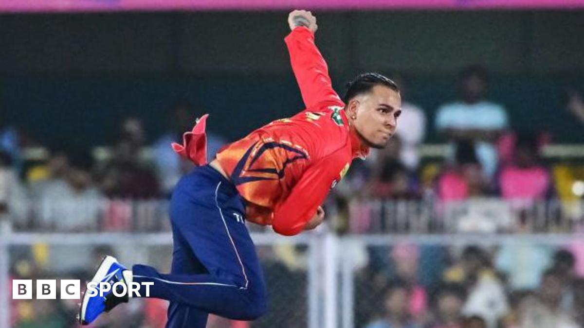 Rahul Chahar delivers a ball during the Indian Premier League (IPL) T20 cricket match between Rajasthan Royals and Punjab Kings
