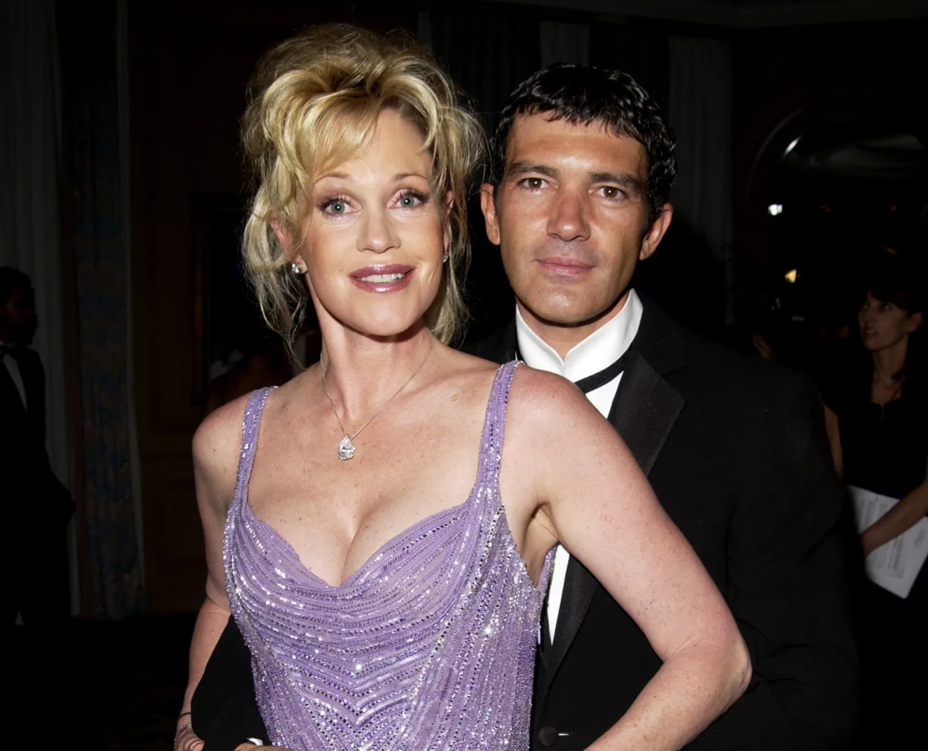 Melanie Griffith and Antonio Banderas embrace at the "Femme Fatale" Dinner in Cannes.