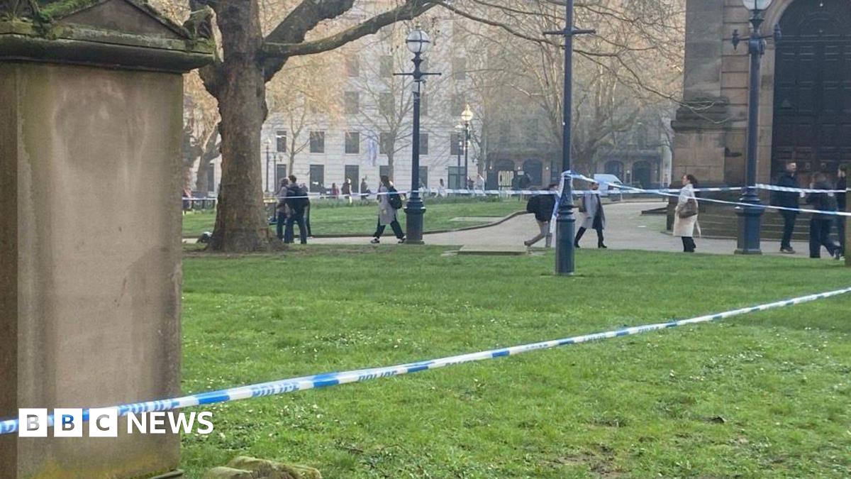 Blue police tape in place in Cathedral Square in Birmingham