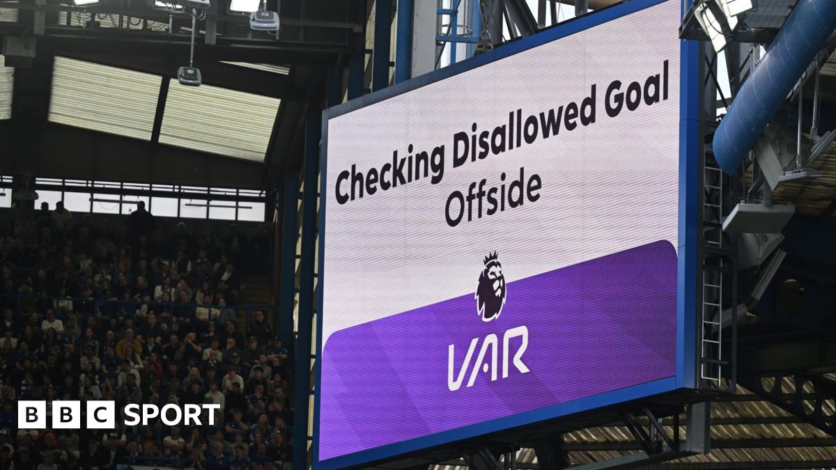 Scoreboard showing a VAR check for offside