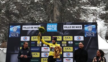 Team Visma - Lease a Bike's Danish rider Jonas Vingegaard celebrates his overall leader yellow jersey on the podium after the 7th stage of the Paris-Nice cycling race, 47 km between Le Broc and Isola-Village, on March 14, 2026. Due to deteriorating weather conditions, the route of stage 7 has been changed to a 47 km race from Le Broc to Isola. (Photo by Anne-Christine POUJOULAT / AFP)