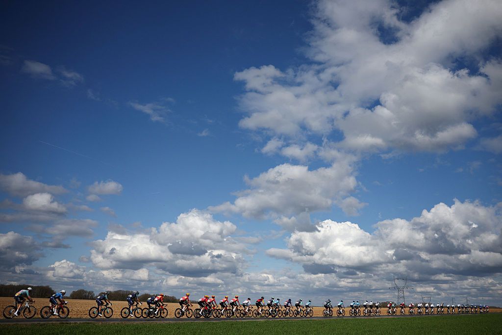 The pack rides during the 2nd stage of the Paris-Nice cycling race, 187 km between &amp;Eacute;p&amp;ocirc;ne and Montargis, on March 9, 2026. (Photo by Anne-Christine POUJOULAT / AFP)