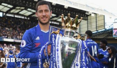 Eden Hazard of Chelsea poses with the Premier League trophy