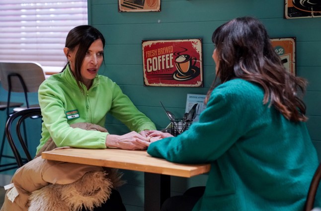 Bea Pollard and Honey Mitchell sharing a table in the cafe in Coronation Street