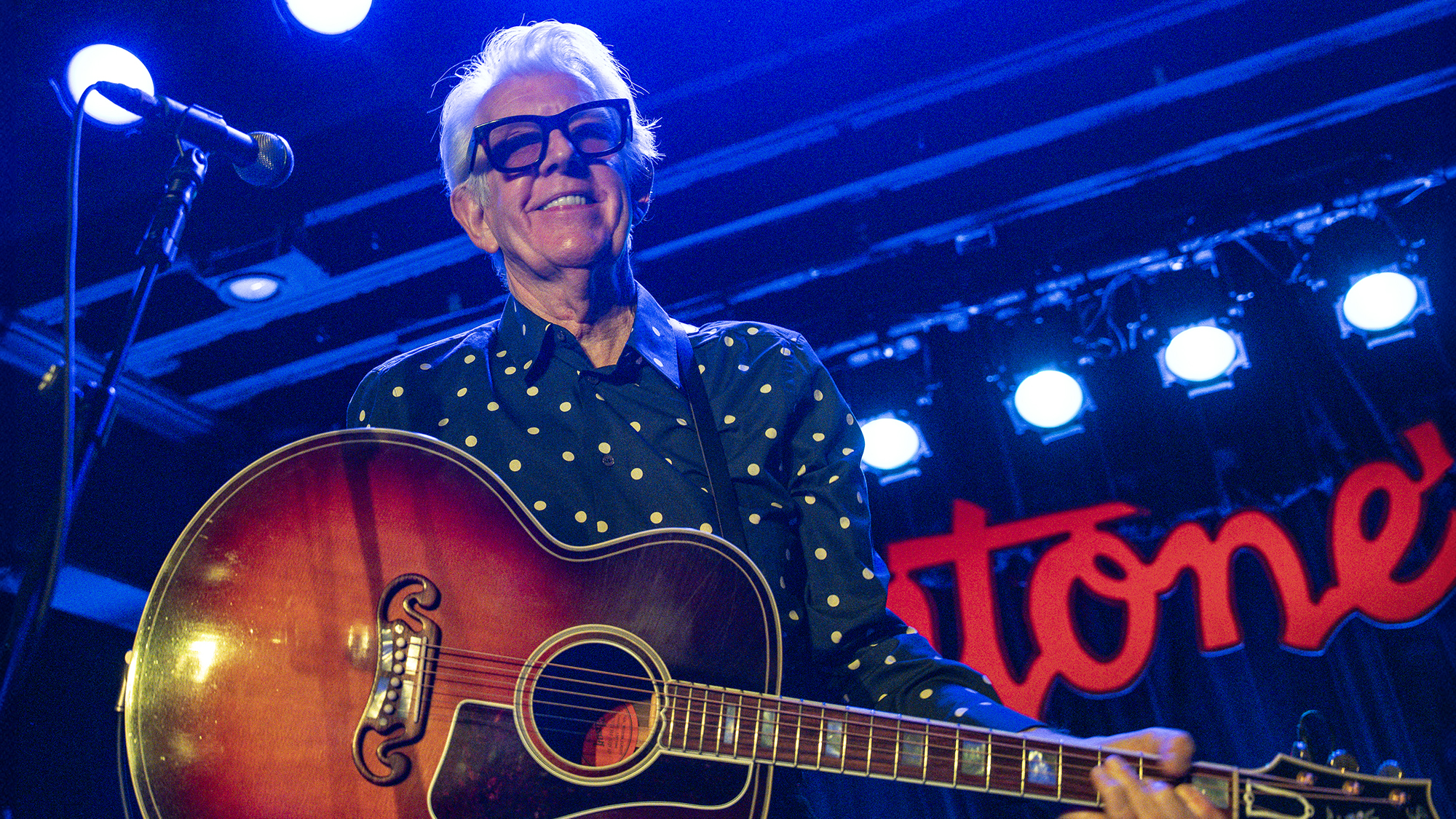 Nick Lowe performs onstage with Los Straitjackets at Antone's on December 15, 2024 in Austin, Texas.