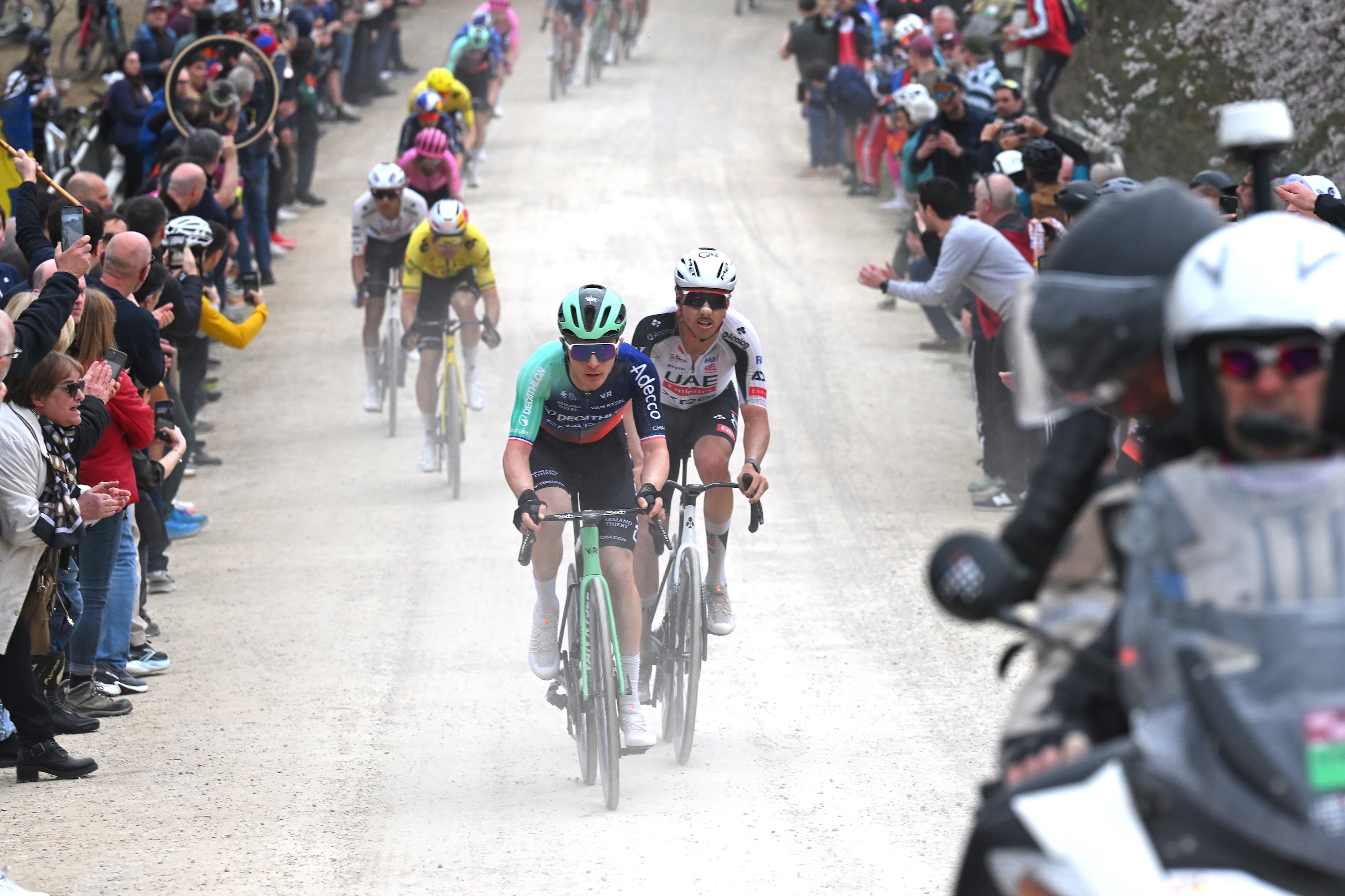 SIENA, ITALY - MARCH 07: (L-R) Paul Lapeira of France and Team Decathlon CMA CGM and Jan Christen of Switzerland and UAE Team Emirates - XRG compete during the 20th Strade Bianche 2026 a 203km one day race from Siena to Siena / #UCIWT / on March 07, 2026 in Siena, Italy. (Photo by Tim de Waele/Getty Images)