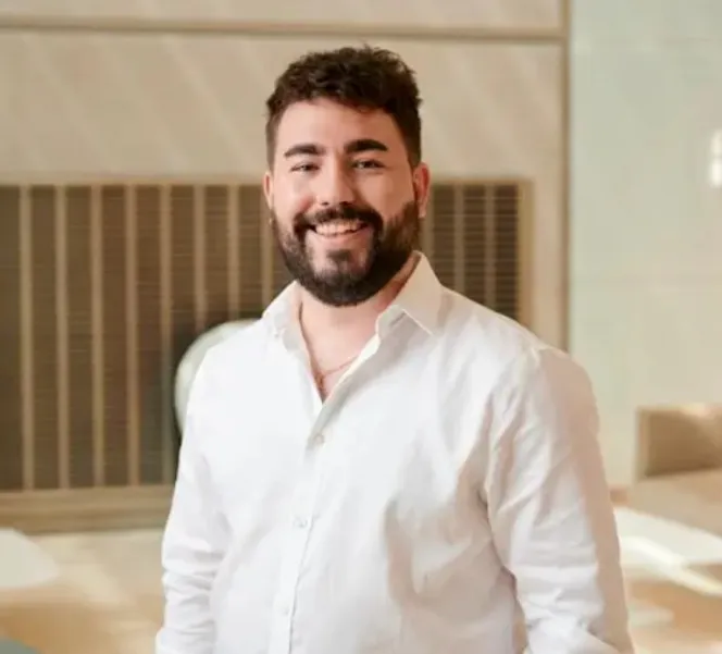 Matt Sample, senior health policy manager at Cancer Research UK, smiling.