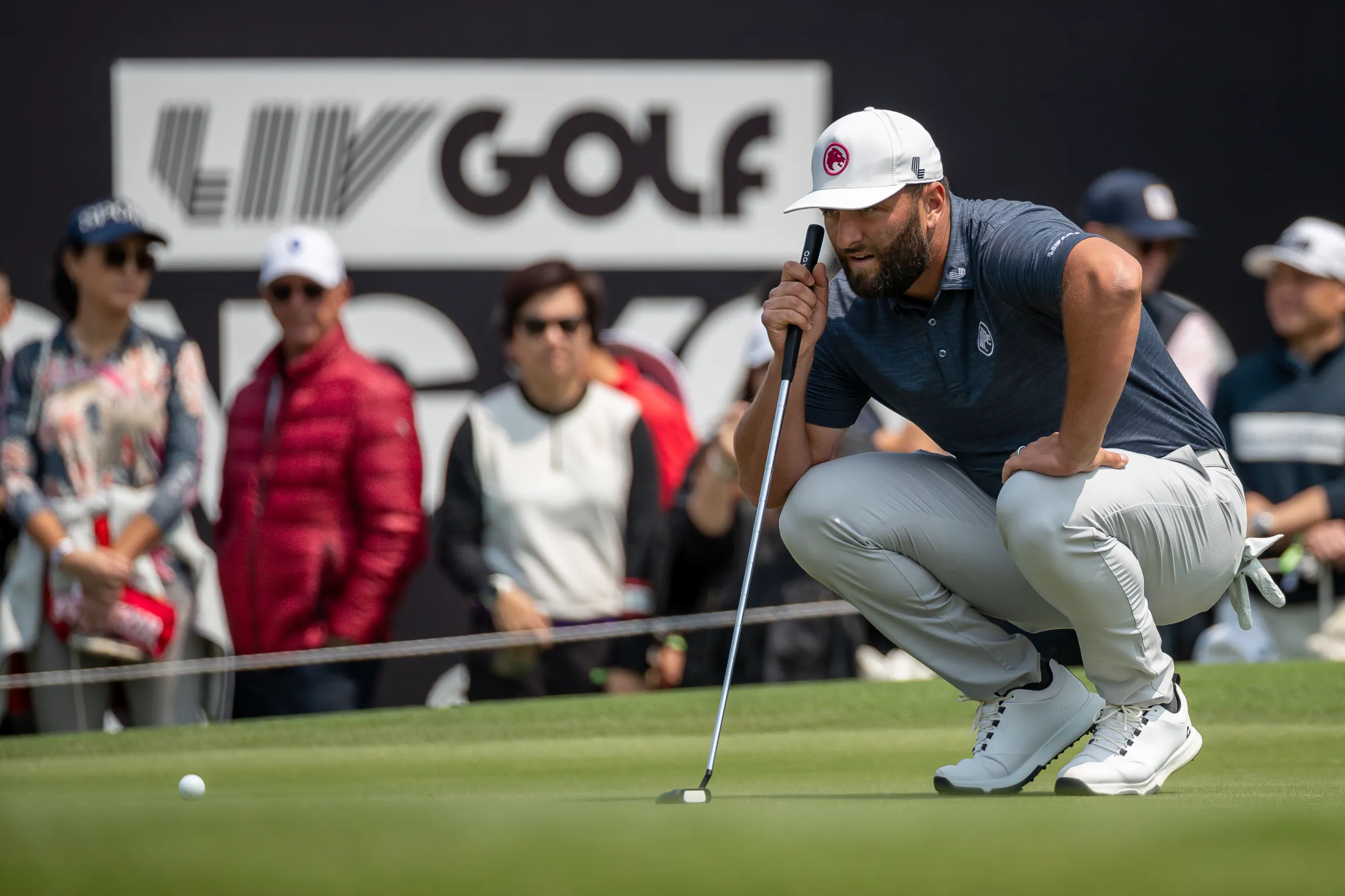 Jon Rahm pondering his next move during day one of the LIV Golf Invitational - Hong Kong.