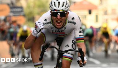 World champion Tadej Pogacar roars in celebration after winning Milan-San Remo