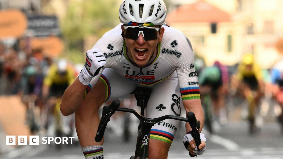 World champion Tadej Pogacar roars in celebration after winning Milan-San Remo