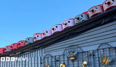 A shop stands beneath a clear blue sky. The shop name is Tecso - in the same red type used by supermarket Tesco. Underneath the name, in white lettering on a green background, is spelled: Furniture Clarance.