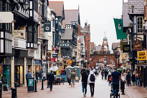 Pedestrian shopping street (Bridge Street) in Chester, England, UK - stock photo Pedestrian shopping street (Bridge Street) in Chester, England, UK - stock photo