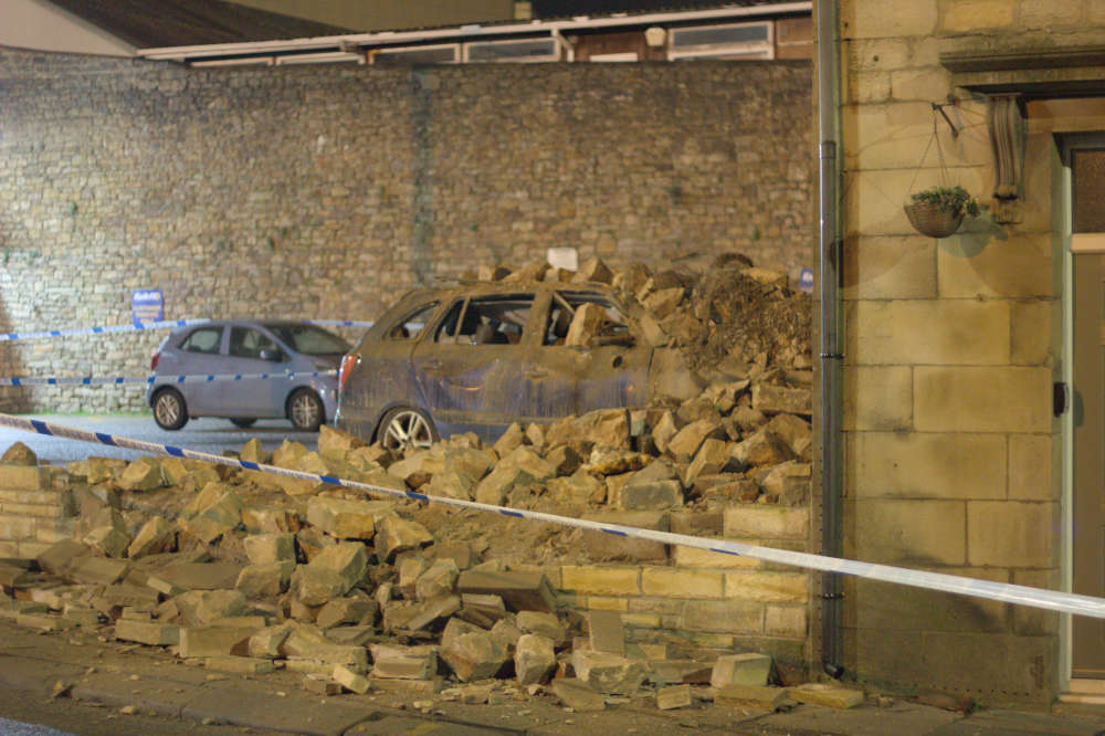 PHOTOS: Traffic chaos as wall collapses onto parked car in Lancaster city centre