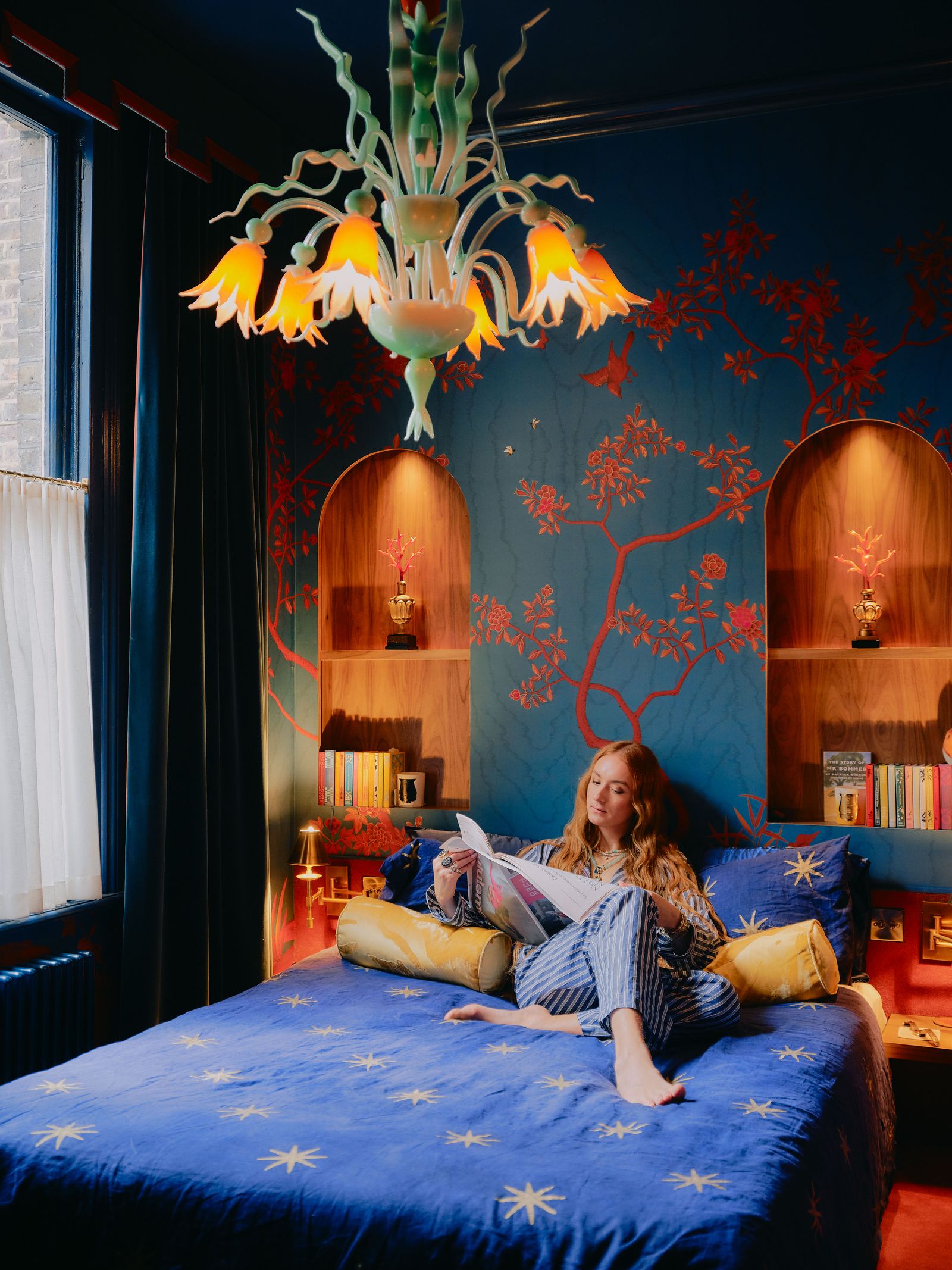 Harris Reeds stylish west London flat is as theatrical as his designs for fashion and furnishings blue bedroom interiors...