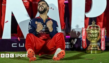 An England player behind a question mark