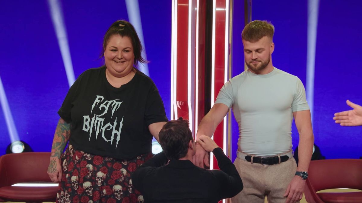 Jo and Reuben in handcuffs and preparing to meet for the first time