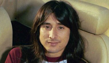 Steve Perry of Journey posing for a photograph in 1980
