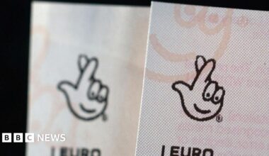Zoomed in view of two EuroMillions tickets side-by-side, with the National Lottery logo seen at the top of both