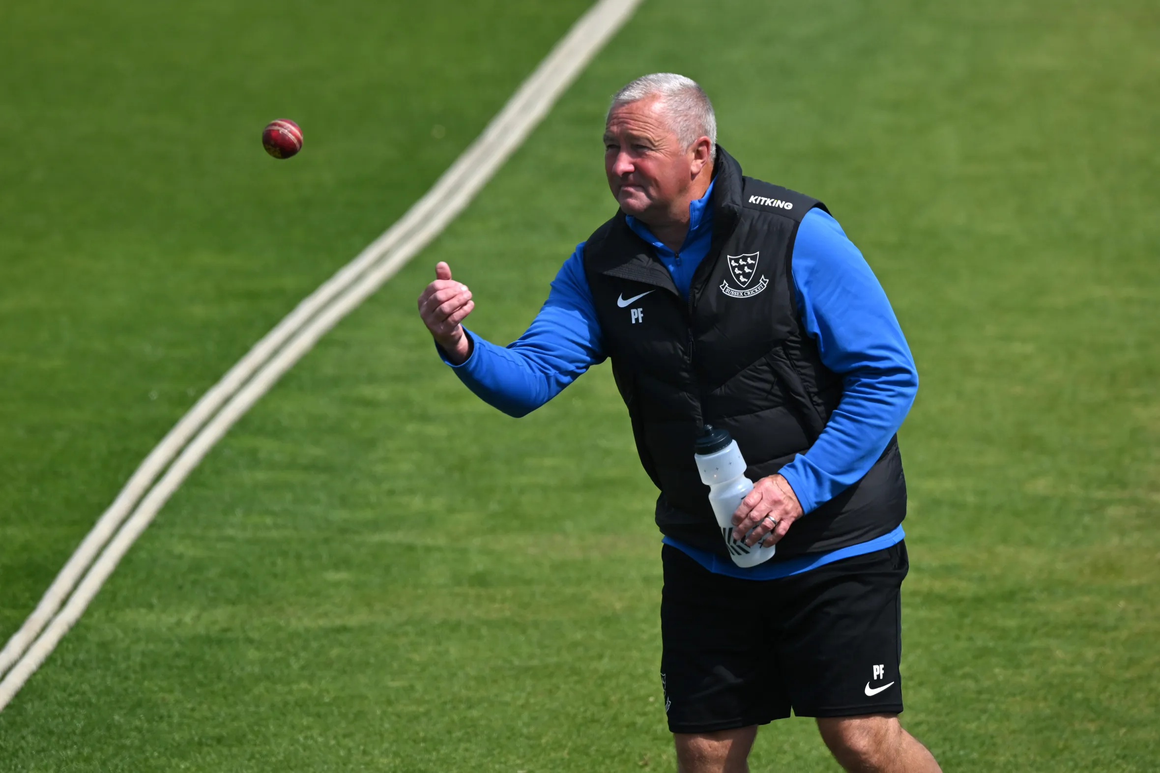 Sussex coach Paul Farbrace returning the ball.