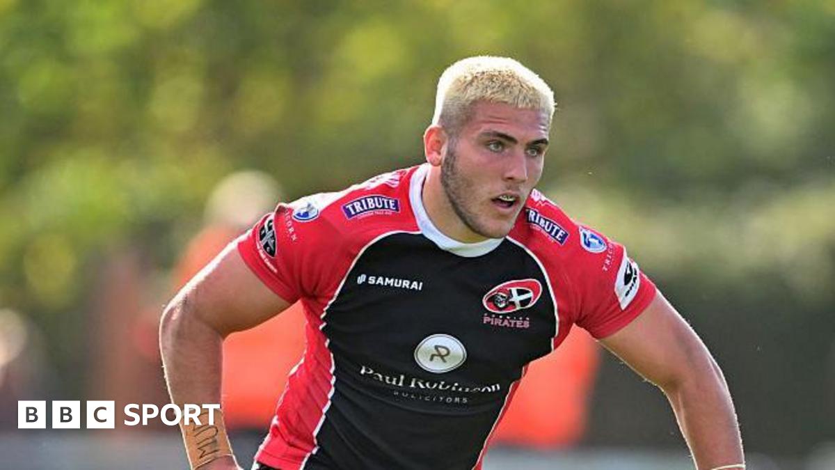 Sol Moody in the red and black shirt of Champ side Cornish Pirates