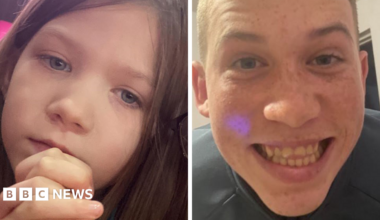 A composite of Darcie and Roman Casselden. Only their faces can be seen in the picture. Darcie has brown hair, blue eyes and is expressionless. Roman is smiling at the camera.