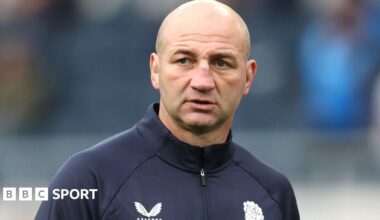 England players in a huddle during training