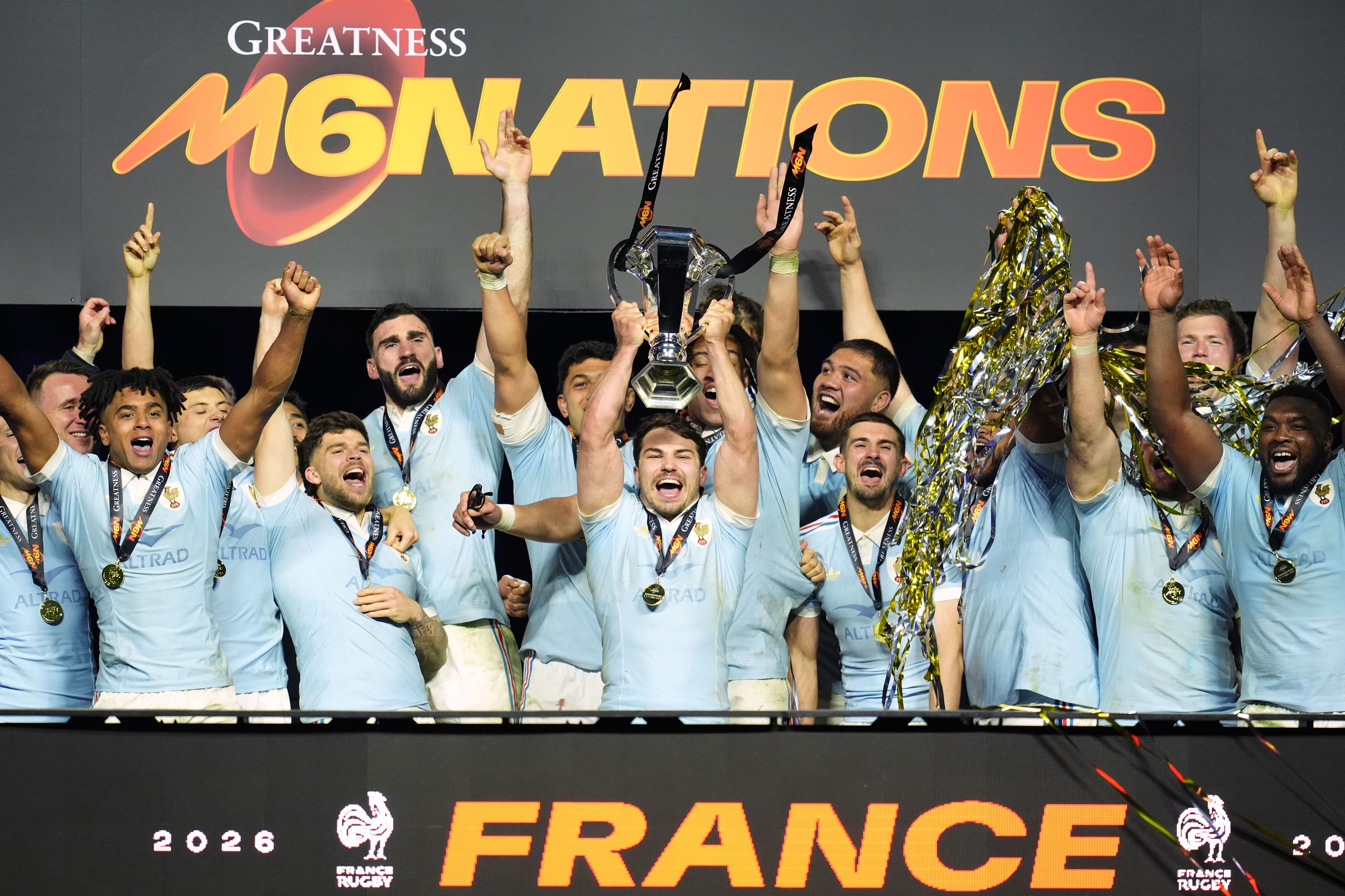 France’s Antoine Dupont lifts the Six Nations Trophy (Adam Davy/PA)