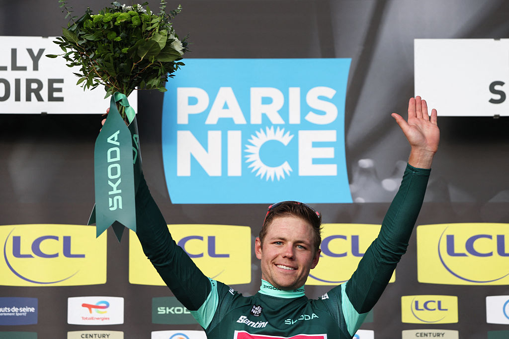 EF Education - EasyPost's US rider Luke Lamperti celebrates his green jersey of best sprinter on the podium after the 3rd stage of the Paris-Nice cycling race, 23.5 km team time-trial between Cosne-Cours-sur-Loire and Pouilly-sur-Loire, on March 10, 2026. (Photo by Anne-Christine POUJOULAT / AFP)