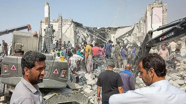 People search through rubble of girls school hit by US strike