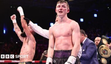 Colm Murphy disappointed as Jono Carroll has his hand raised in victory