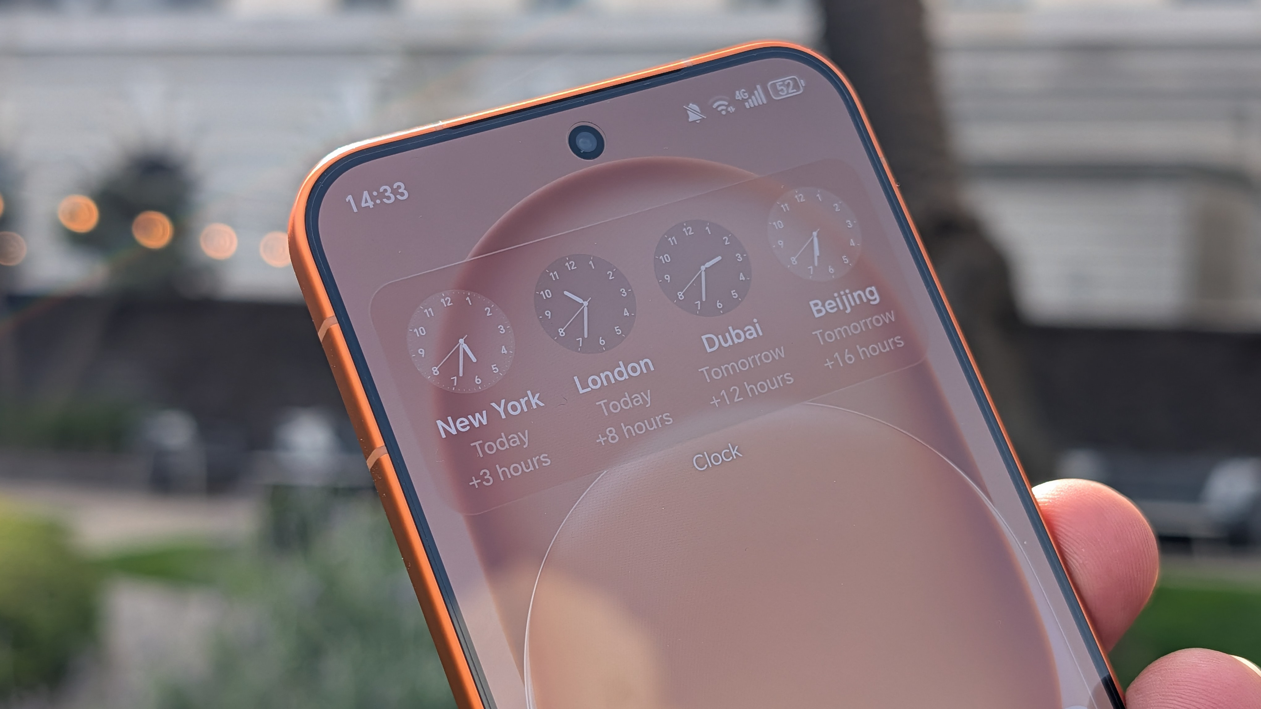 Selfie camera on the Honor Magic 8 Pro Air in orange in the hand