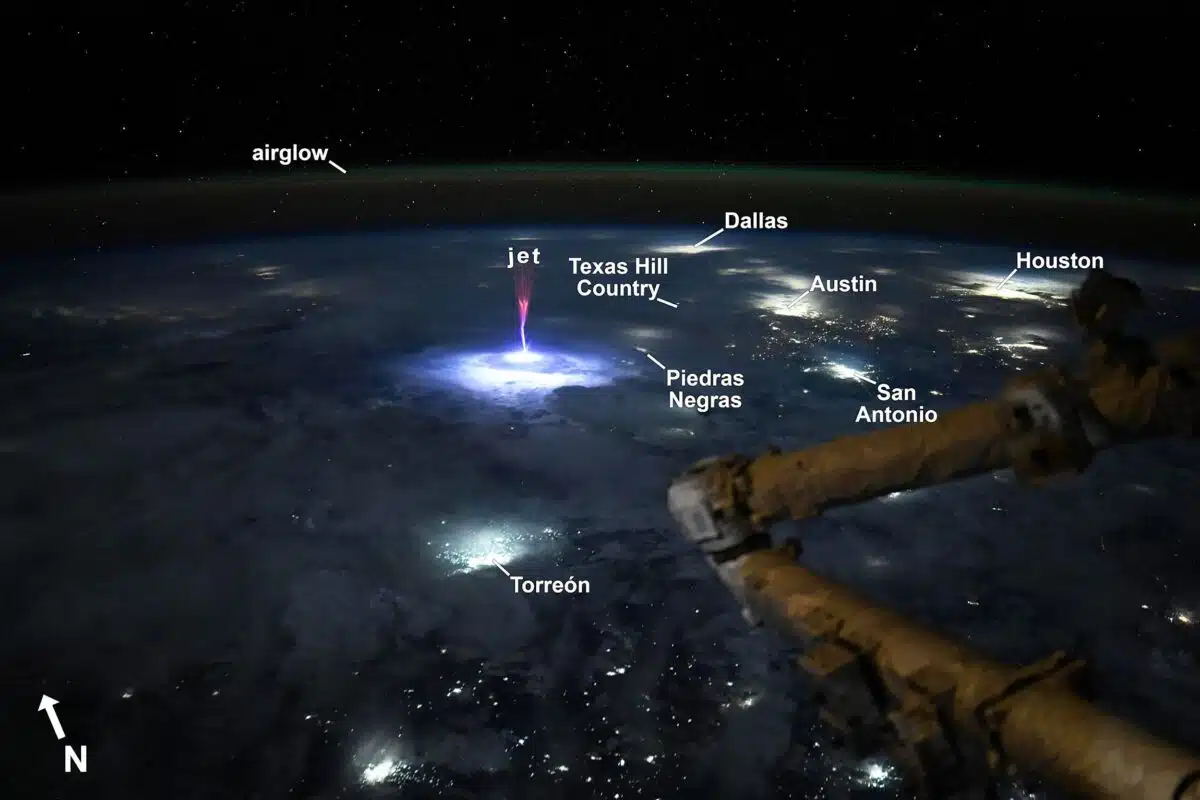 A Rare Red Sprite Flashes Above A Powerful Storm Near Texas In A Photo Taken From The Iss.