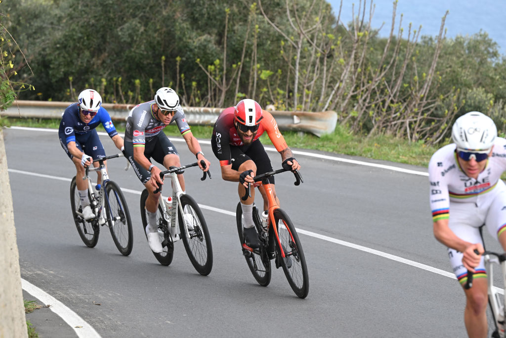 SANREMO ITALY MARCH 22 LR Mathieu Van Der Poel of Netherlands and Team Alpecin Deceuninck and Filippo Ganna of Italy and Team INEOS Grenadiers compete during the 116th MilanoSanremo 2025 a 289km one day race from Pavia to Sanremo UCIWT on March 22 2025 in Sanremo Italy Photo by Dario BelingheriGetty Images