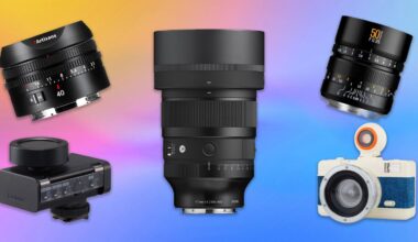 Five different camera lenses and a white camera with an orange lens are displayed against a colorful gradient background. The lenses vary in size and design, and one has a digital display.