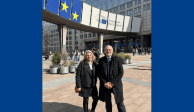 Naomi Pohl and Dave Webster outside the European Parliament building.
