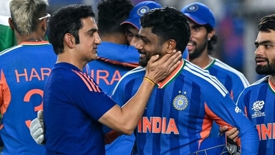 India's Sanju Samson (C) celebrates with his coach Gautam Gambhir (L). (AFP)