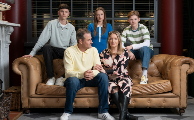 Hollyoaks Hutchinson family with Diane and Tony looking sad