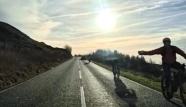 Driving instructor close passes cyclist on climb