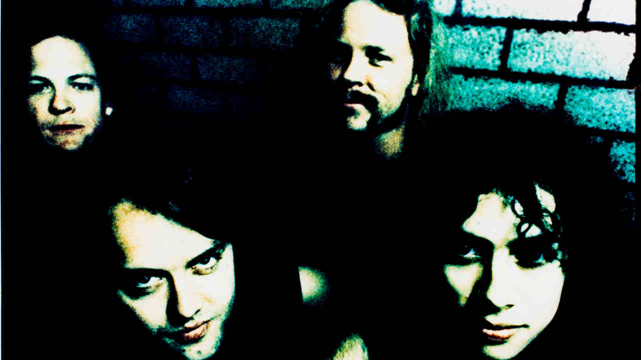 Metallica posing for a photograph in 1990