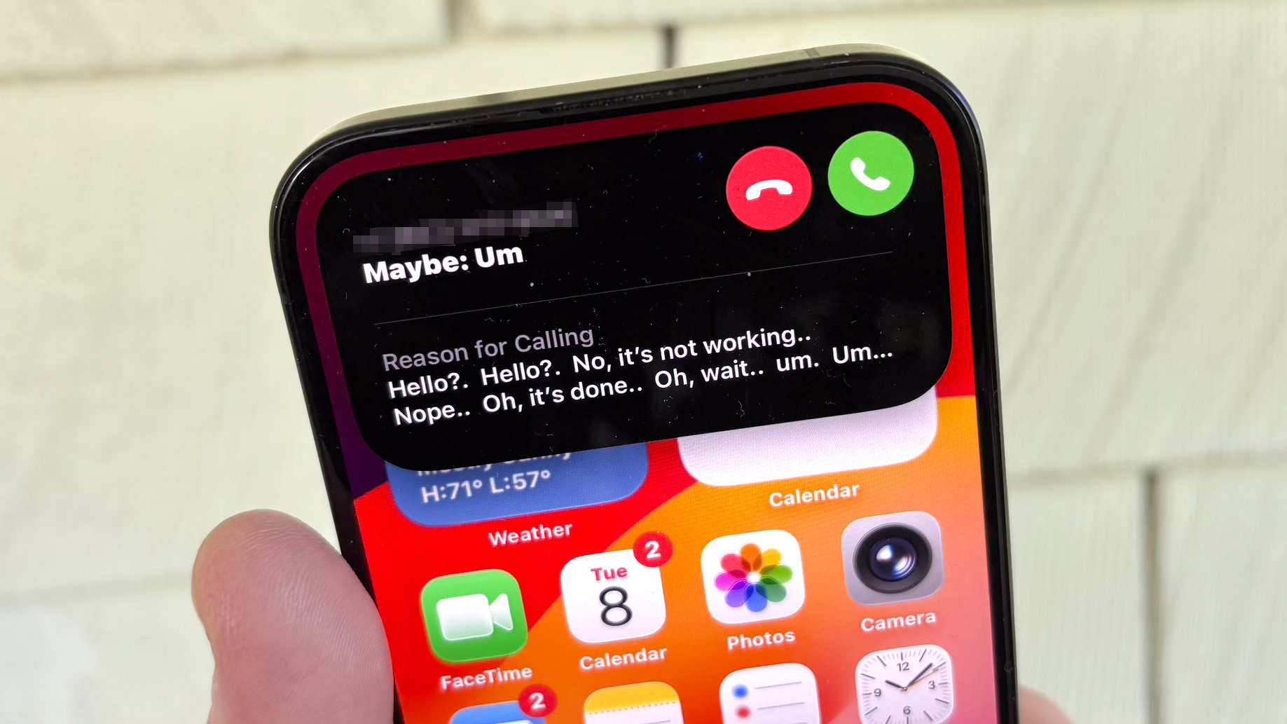 iOS 26 call screening feature on an iPhone 15 Pro